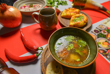 Traditional Georgian food on a National Georgia flag background. Top view, flat lay concept, menu concept.