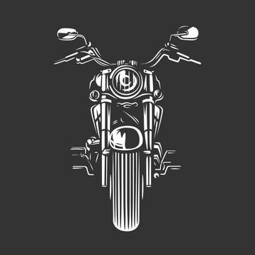Chopper motorcycle front view isolated on black background.