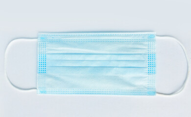 
blue medical mask on white background