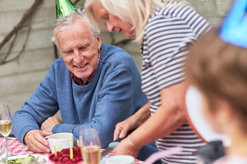 Seniors celebrate birthday with a cake