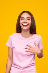Fototapeta premium Sincere young woman smiling for camera
