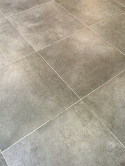 grey rock tile flooring going into the distance perspective angle