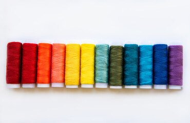 Spools of thread on the colors of the rainbow