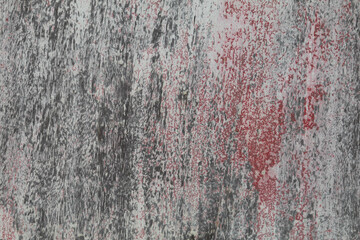 Old wooden door For more than eighty years in the sun and for a long time it is deteriorating with time and the color is peeling off the wood.