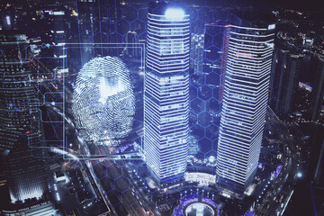 Double exposure of finger print hologram and cityscape background. Concept of personal security.