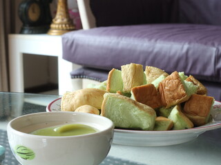 Custard breads on a glass table during afternoon