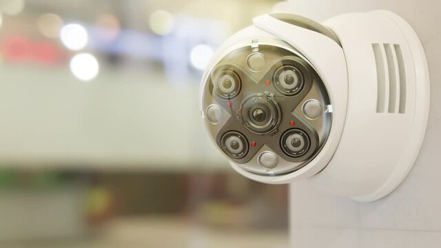 Futuristic security CCTV camera with Motion sensor. Scan the area for surveillance purposes. Animation seamless loop, 3D Render.