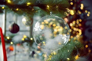 Closeup of 2021 a decorated Christmas tree with bokeh, copy space, Xmas holiday background.