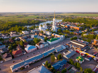 Obraz premium Aerial panoramic view of Shuya cityscape on bank of Teza River with Resurrection Cathedral and belfry, Russia