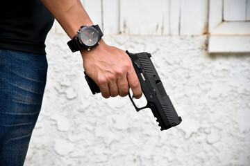 Black short gun, concept for shooting sport, killers, and violence.