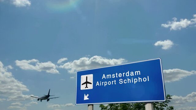 Jet airplane landing in Amsterdam, Netherlands, Schiphol, Holland. City arrival with airport direction sign. Travel, business, tourism and transport concept. 3D rendering animation.