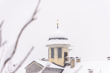 Brunico under a heavy snowfall. Scent of snow. Italy