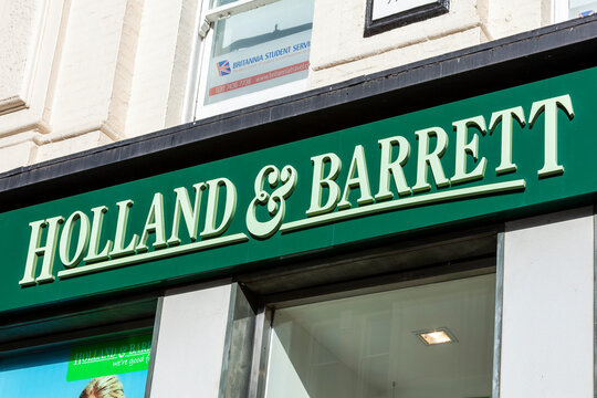 London, UK, April 1, 2012 : Holland & Barrett logo advertising sign outside its business retail store which sells health benefit products and a stock photo image