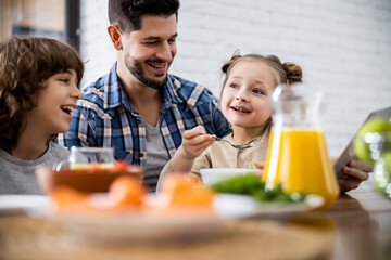 Father looking at his daughter