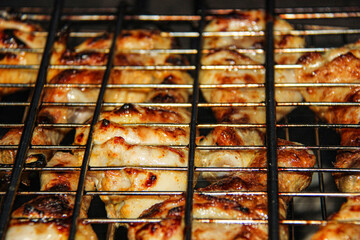 Marinated chicken kebabs on the grill, Sunny day. In spring. Selective focus.