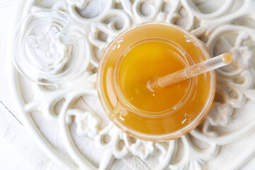 Glass jar with raw flower honey