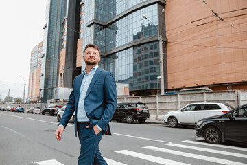 Russian businessman in a suit in the background of the city