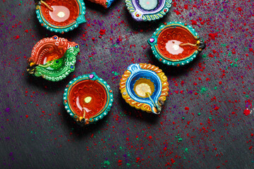 happy diwali or happy deepavali greeting card made using a photograph of diya or oil lamp
