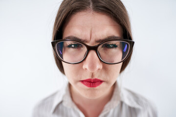 Young businesswoman frowning