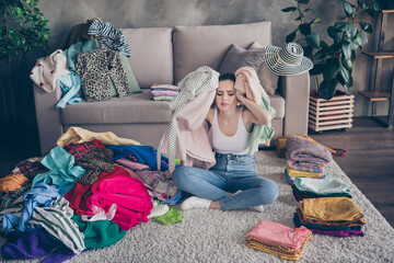 Photo of pretty stressed crying lady stay home quarantine many clothes heap stack floor wardrobe...