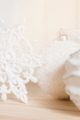 Fototapeta na wymiar Close-up of white elegant Christmas ornaments