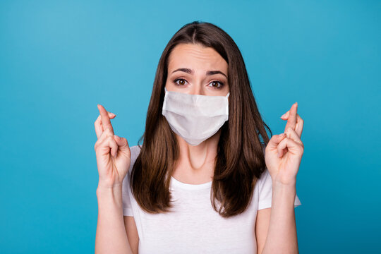 Portrait Of Nervous Anxious Girl Feel Fear About Covid Infection Spreading Hope Make Lucky Symbol Wear Good Look Medical Mask Clothes Isolated Over Blue Color Background