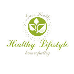 Green spring leaves vector symbol for use in holistic medicine, rehabilitation or pharmacology. Wellness and harmony symbolic emblem.
