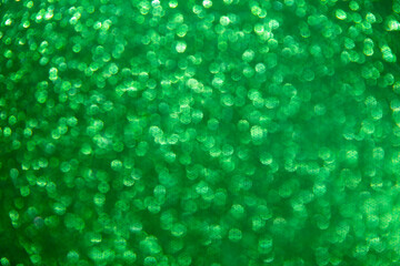 blured green glitter texture abstract background