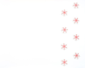 Christmas, New Year or winter white background with wooden white with red snowflakes. Xmas and Happy New Year holiday concept. New Year greeting card. Flat lay, top view, copy space.