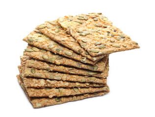 Crispbread with Gouda cheese and pumpkin seeds isolated on white background