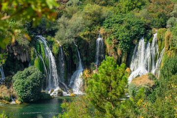 Fototapeta na wymiar Kravica waterfall on Trebizat river, Bosnia and Herzegovina