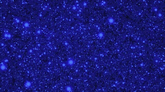 Abstract and hazy background and floating blue particles simulating space or seabed