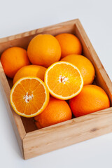 oranges in a wooden box
