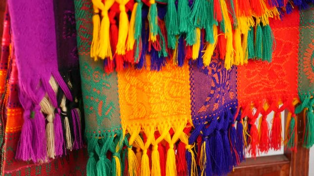 Colorful mexican wool serape blankets texture. Woven ornamental vivid textile with authentic latin american pattern. Striped multi colored fabric for poncho and sombrero. Hispanic indigenous style.