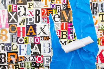 Colorful collage from clippings with letters and numbers and torn crumpled piece of blue paper....