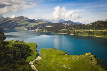 Naklejka na ściany i meble Panorama au drone Lac de Roselend et Barrage en été Beaufortain Savoie Alpes