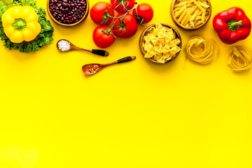 Vegan food cooking ingredients - vegetables and herbs top view