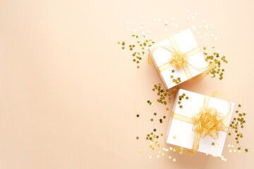 Gifts boxes on light background. Christmas festive layout