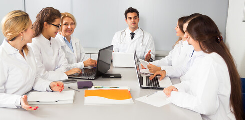 Meeting of doctors in conference room
