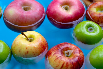 Washing fresh apples in the water
