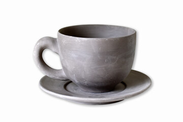 Coffee cup was made from pottery before being burnt to fire on white background.