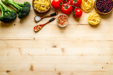 Vegan food cooking ingredients - vegetables and herbs top view