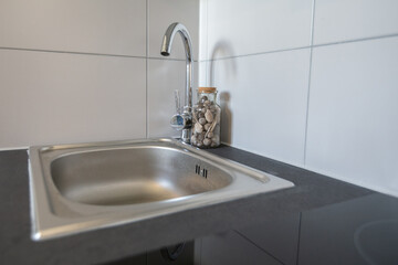 Fototapeta na wymiar Kitchen faucet, tap, sink, kitchen element