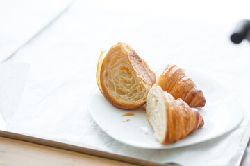 Freshly baked croissant cut into pieces