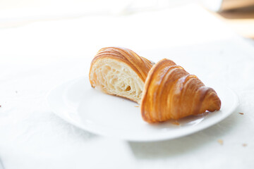 Freshly baked croissant cut into pieces