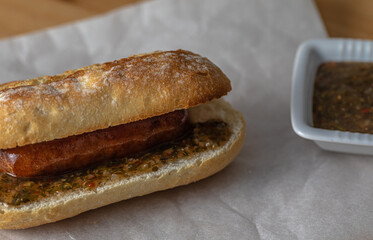 Choripan sandwich with chorizo popular in Argentina, Uruguay, Chile and southern Brazil