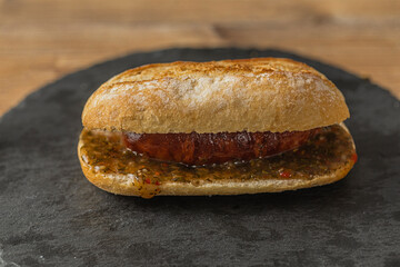Choripan sandwich with chorizo popular in Argentina, Uruguay, Chile and southern Brazil