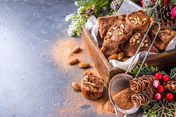 Traditional italian winter and Christmas dessert. Homemade chocolate salami sausage, on festive  background with Christmas decoration