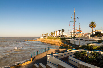 Plakat Chipiona, Spain. The promenade or quay close to the lighthouse in this town in Andalucia