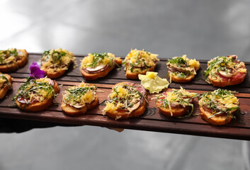 Cheese and Crackers on a wooden tray
